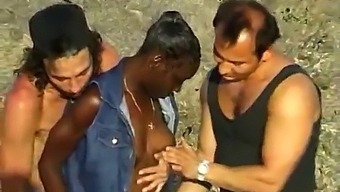 Two White Guys Take Turns Fucking A Black Woman On The Beach
