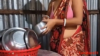 Indian Wife'S Intimate Moment In A Rural Kitchen