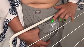 A Massive Stepmother'S Huge Penis Rubbing Against Clothes Dryer Under Her Stepson'S Observation
