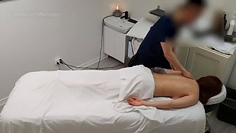 A Young Waitress Receives An Unexpected Massage From A Tattooed Male Client At A Spa